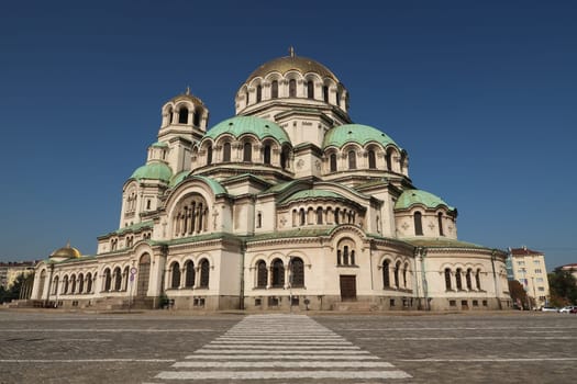 View onto the St. Alexander Nevsky Cathedral in Sofia with a crosswalk in the front, Bulgaria 2021