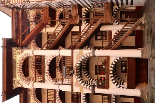 Closeup on the many wooden stairs of the residential part of Rila Monastery, Bulgaria 2021