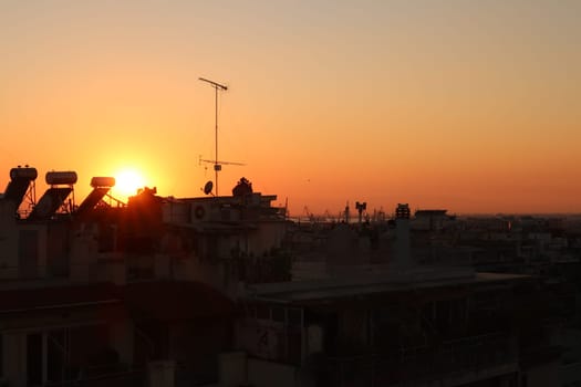 Picturesque view from a rooftop in downtown Thessaloniki at sunset, Greece 2021