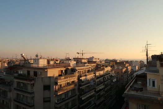 View from a rooftop in downtown Thessaloniki at golden hour, Greece 2021