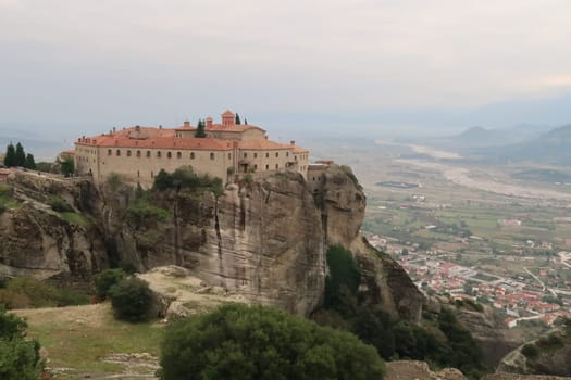 St. Stephen Monastery with the town Kalambaka in the background, Meteora, Greece 2021