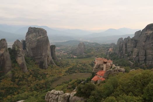 The Monasteries of St. Nicholas Anapafsas, Roussanou surrounded by stone columns, Meteora, Greece 2021