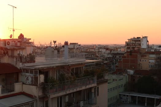 Beautiful view from a rooftop in downtown Thessaloniki at golden hour, Greece 2021