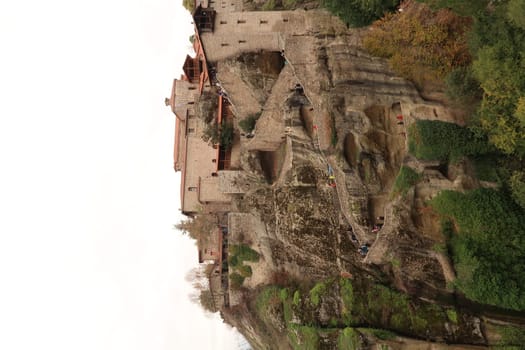 Vertikal shot of the Holy Monastery of Great Meteoron, built on top of a rock, Meteora, Greece 2021