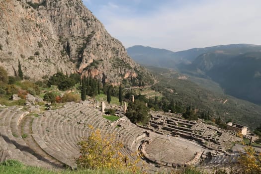 Stunning view onto Delphi's famous theatre and the spectacular landscape behind, Delphi, Greece 2021
