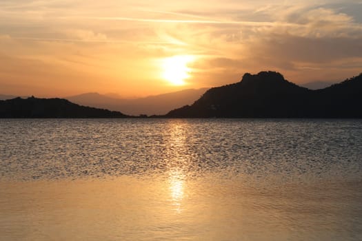 Beautiful sunset over Ireon Lake in the mainland of Greece, 2021
