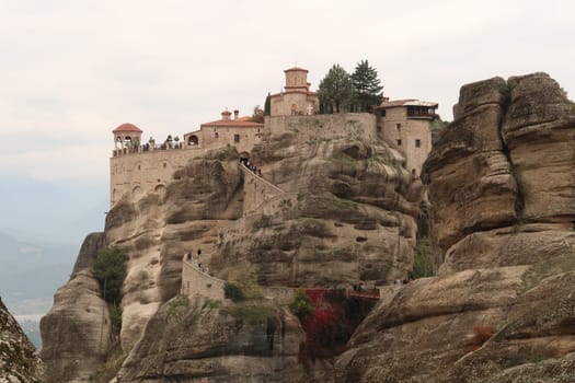 Fantastic view onto the Monastery of Varlaam, built on top of a rock, Meteora, Greece 2021