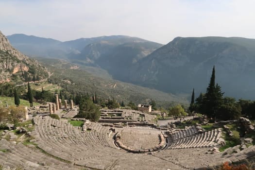 View onto Delphi's ancient theatre and the beautiful landscape behind, Delphi, Greece 2021