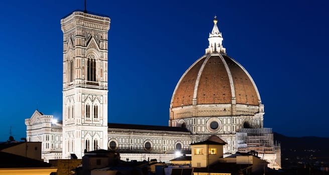 Florence Duomo and Campanile - Bell Tower - architecture illuminated by night, Italy. Urban scene in exterior - nobody