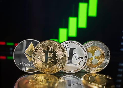 Bitcoin and cryptocurrency investing concept. Bitcoin cryptocurrency coins. Trading on the cryptocurrency exchange. Trends in bitcoin exchange rates. Rise chart of bitcoin and alt coins.