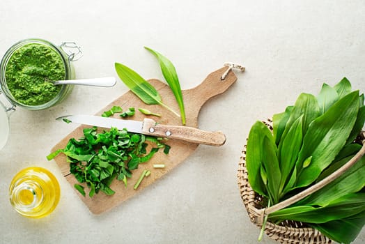 Making Fresh ramson or wild garlic pesto. Healthy spring food concept