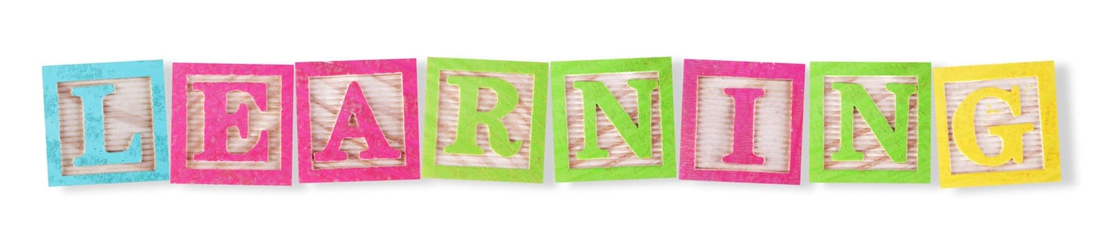 A learning concept with childs wood blocks on white with clipping path to remove shadow