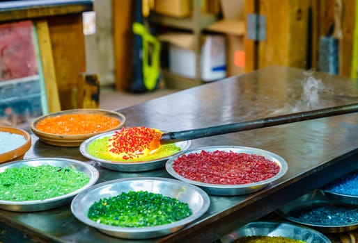 Colored glass frit used in glassblowing projects