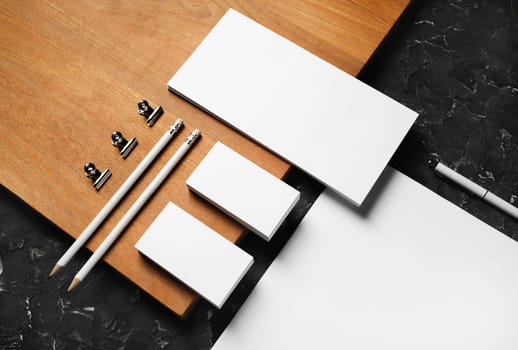 Branding stationery mockup and wooden board. Blank objects for placing your design.