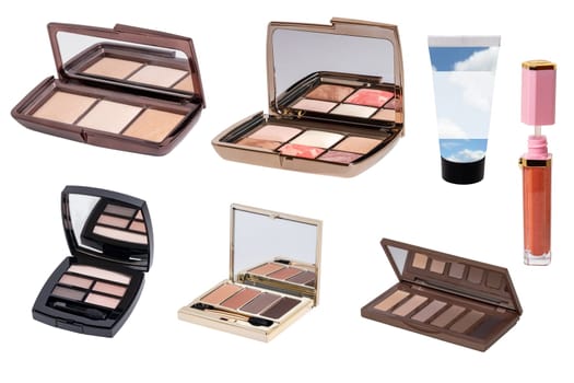 Collage of make up cosmetics and tools. Set of various elegant cosmetic multi-color boxes with mirror and eye shadow powder and various cheek or face powder, creme and lipstick isolated on white.