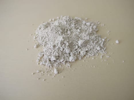 White slurry chalk powder for peeling or mask on a wooden board