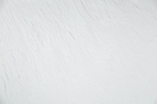 White background with a non-uniform texture. High quality photo