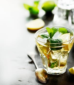 Mojito cocktail on dark table with copyspace.