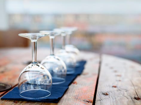 Empty wine glasses in restaurant.