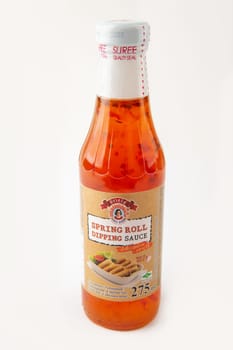 WETZLAR, GERMANY - 2022-04-05: Bottle of SUREE Brand Spring Roll Dipping Sauce over white Background.
