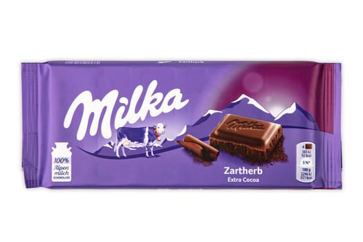 WETZLAR GERMANY - 2022-04-11: Milka chocolate bar on white background. Milka milk chocolate bar. Milka is a brand of chocolate confection which originated in Switzerland in 1901.