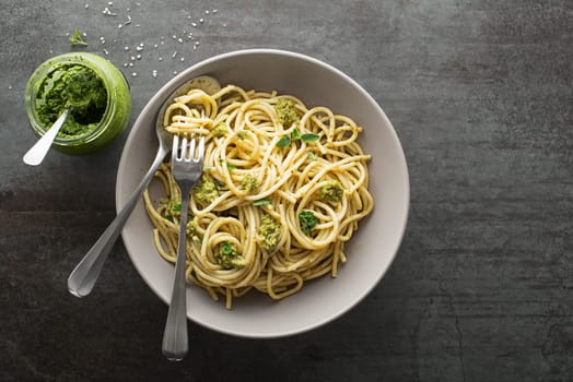 Fresh pasta with basil pesto sauce. Healthy food concept