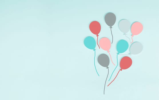 Colorful ballons on a blue colored background, children birthday greeting card, happy holiday, copy space for text