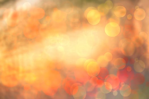 Abstract blurred fresh vivid spring summer light delicate pastel yellow pink orange bokeh background texture with bright circular soft color lights and stars. Beautiful backdrop illustration.