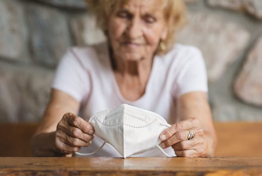 Elderly woman with a face mask during lockdown