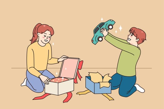 Happy small kids unpack wrapped boxes with presents for birthday. Smiling children feel excited open unbox parcels or gifts for special occasion. Surprise concept. Childcare. Vector illustration.
