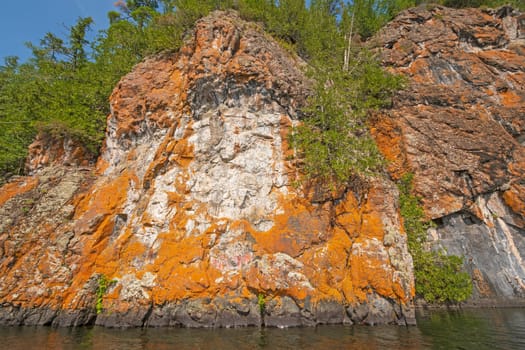 Lichen Colored Cliffs on a Remote Lakeshore on Ottertrack Lake in Quetico Provincial Park in Ontario