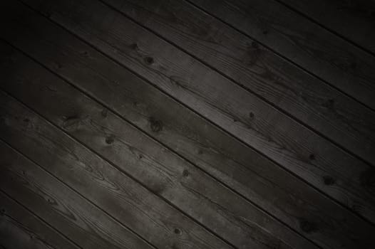 Dark diagonal wooden planks with grey brown color