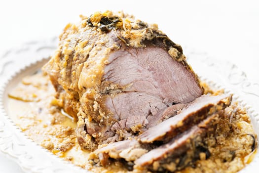 close up of rustic italian pork shoulder  in milk