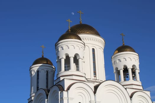 The church is made of white stone. Religion. Orthodoxy. Architecture. High quality photo