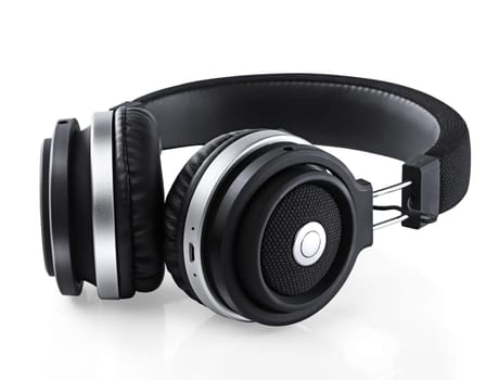 Black headphones over white background