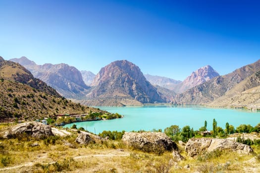 Scenic view of Iskanderkul - an alpine lake in the mountains of Tajikistan