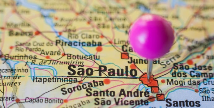 Pushpin marking on Sao Paulo, Brazil. Selective focus on city name