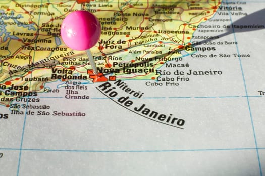 Pushpin marking on Rios de Janeiro, Brazil. Selective focus on city name