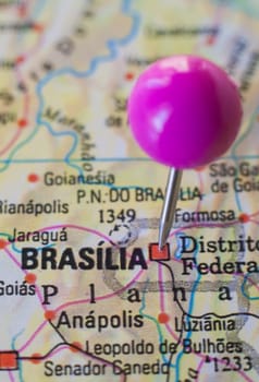Pushpin marking on Brasilia, Brazil. Selective focus on city name