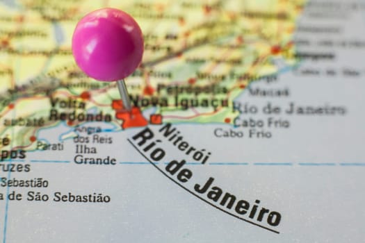 Pushpin marking on Rios de Janeiro, Brazil. Selective focus on city name