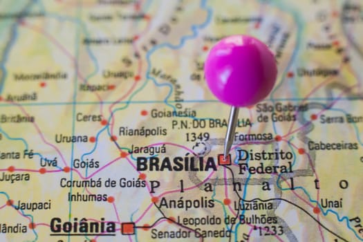 Pushpin marking on Brasilia, Brazil. Selective focus on city name