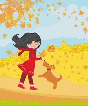 girl playing with her dog in autumn
