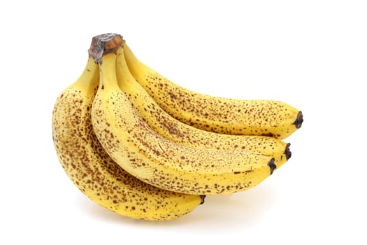 Close up of over-ripe bananas isolated on white background