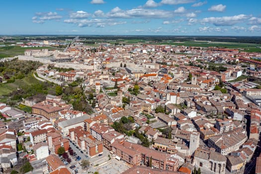 view of Cuellar, a small old town in the province of Segovia, with the reconstructed castle in the foreground.