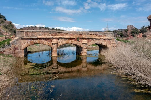 Renaissance bridge from the 17th century over the Salado river. Riba de Santiuste, Guadalajara, Spain