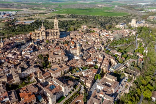 View of the Alcazar fortress and St Mary cathedral of segovia, listed world Heritage center by UNESCO Panoramic aerial view