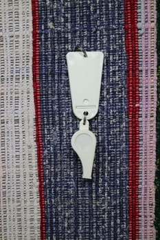 Sports whistle, signal, fan, white with a tag