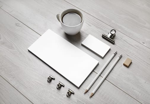 Blank stationery set on light wooden background. ID template. Mockup for branding identity for designers.