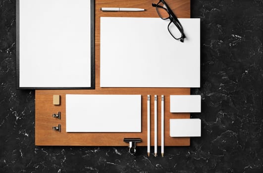 Blank corporate stationery set and wooden board. ID template. Mockup for branding identity for designers. Flat lay.