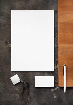 Brand identity mockup. Blank corporate stationery set and keys. Copy space for text. Flat lay.